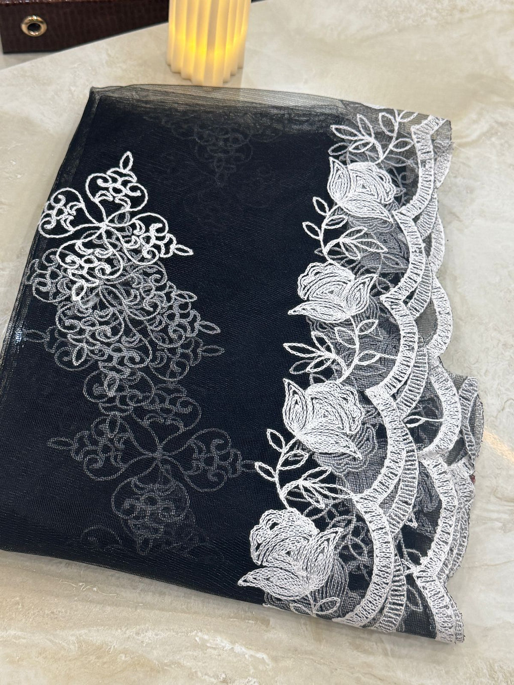 Embroidered black and white