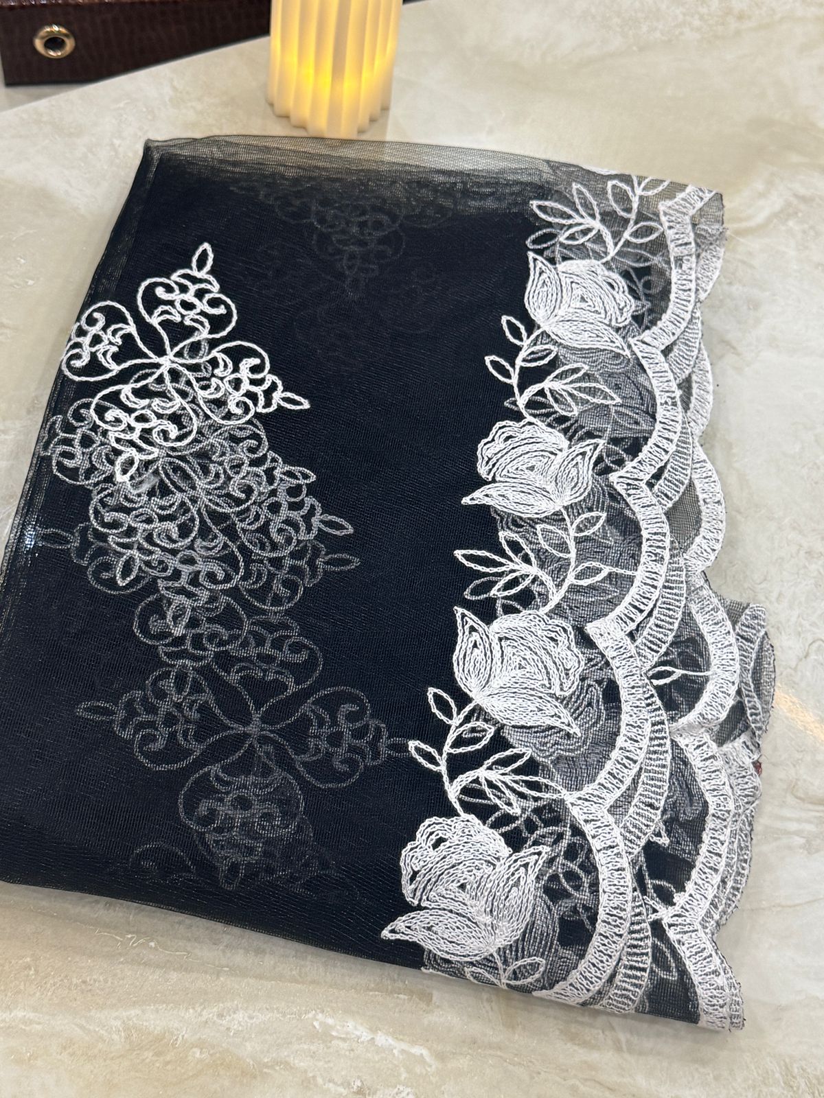 Embroidered black and white